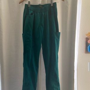 Jaanuu scrubs. Emerald green. Size small. Only tried on never worn.